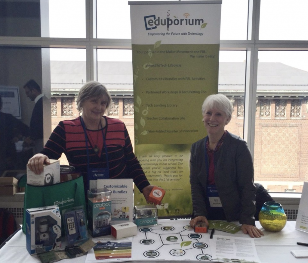 the eduporium team exhibiting at a booth