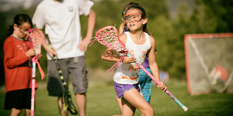 students playing lacrosse